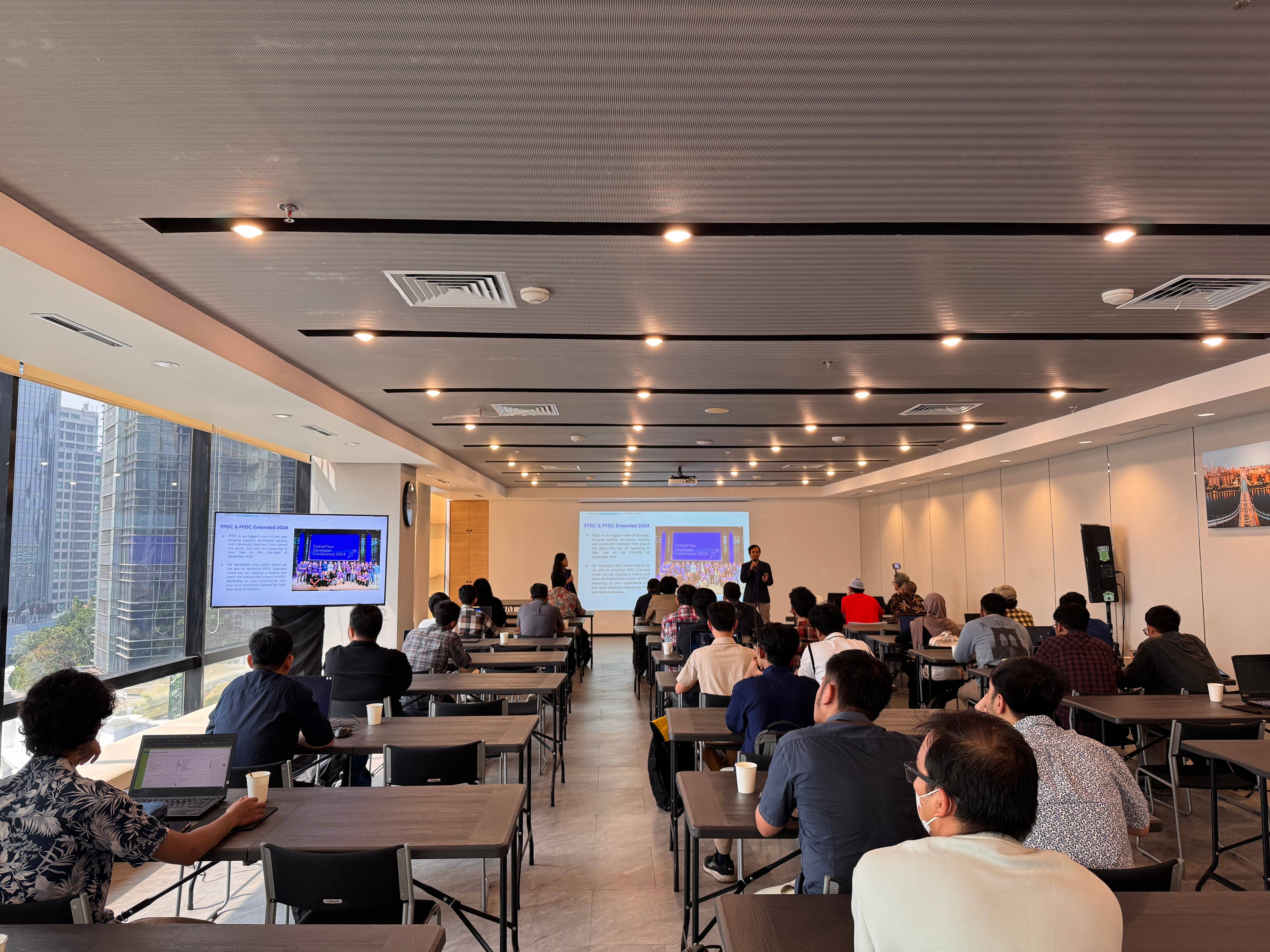 Professional seminar with attendees, representing Hitopia's commitment to expertise and talent development